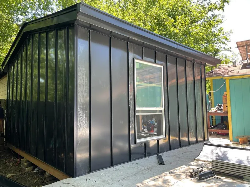 Black standing seam metal wall panels for Roof Inspection in Mineral Wells